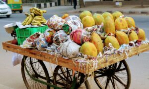 assorted fruits on fruit rack