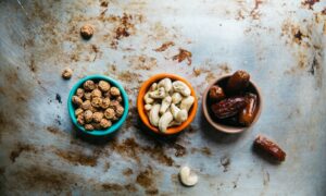 three bowls of nuts