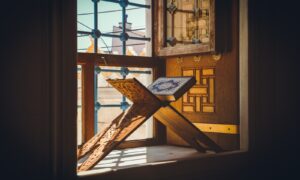 black and white table lamp on brown wooden table