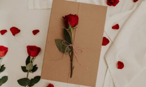 red rose on brown envelope