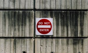 white and red do not enter signage