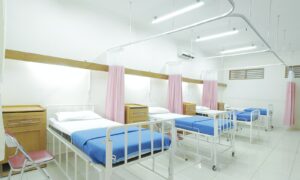 empty hospital bed inside room