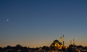 city skyline during night time