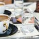 white ceramic cup on table