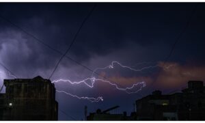 lightning striking a city